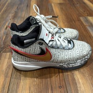 Nike White and Black Shoes with Red and Gold Details